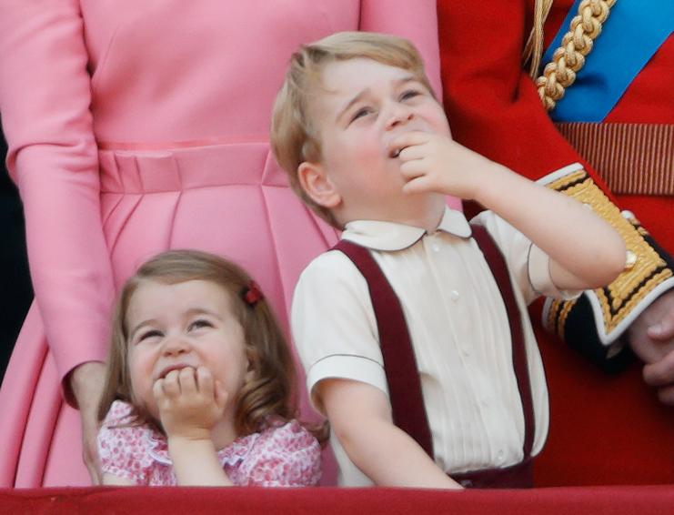  Prince George and his sister Charlotte admire the Royal flyover for the annual Trooping the Colour