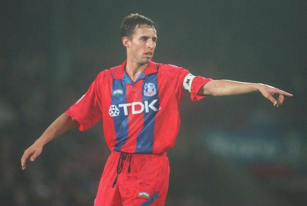 He played in midfield and at right-back during his Palace days