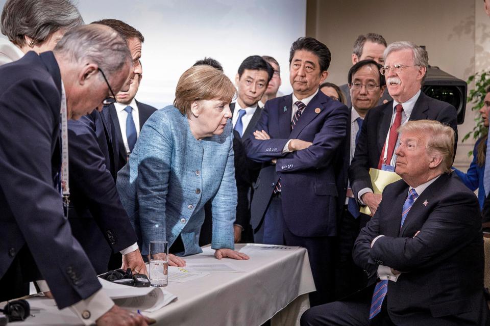  This photo, taken at the G7 summit, shows Trump appearing defensive as his allies gang up on him