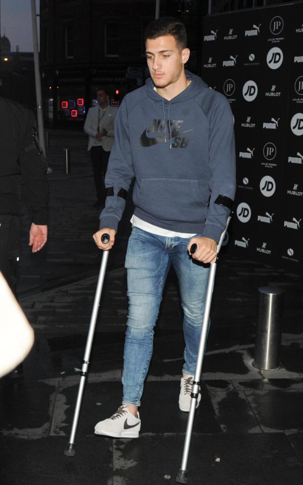  Diogo Dalot was snapped out in Manchester shortly after joining the club on crutches