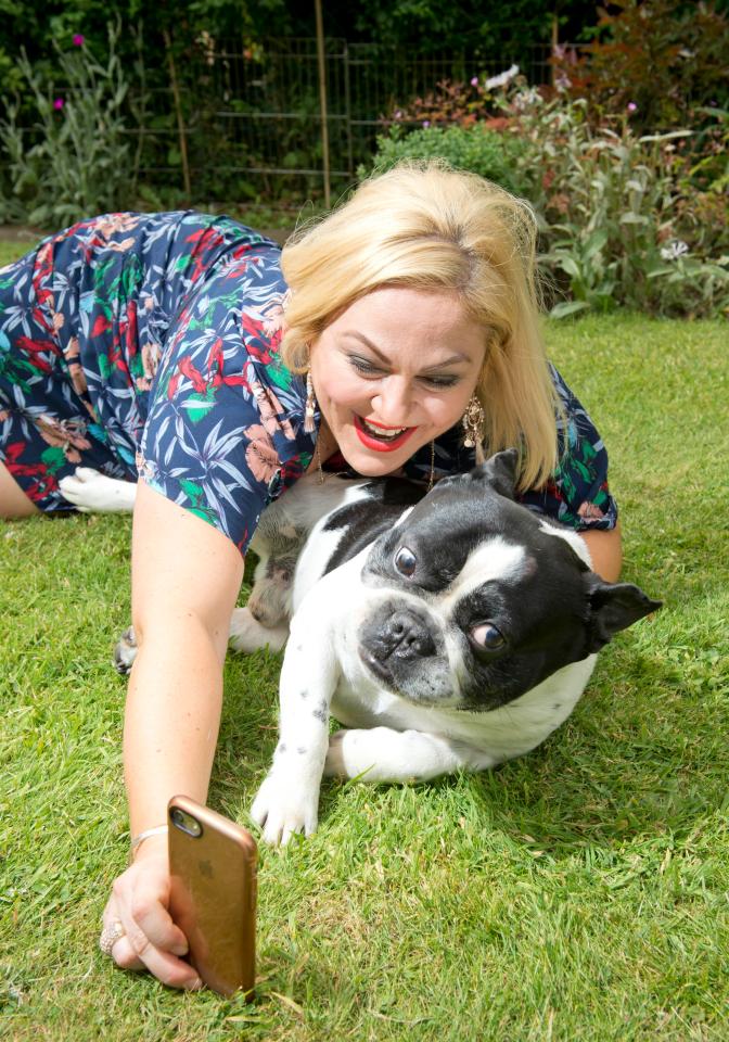  Hannah Coleman uploads 49 pictures and videos a day of her beloved pooch