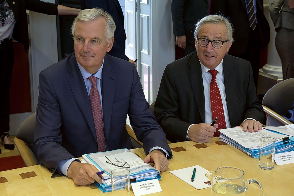 There are claims EU bosses Michel Barnier, right, and Jean-Claude Juncker, left, will need her to water down Mrs May’s proposal further