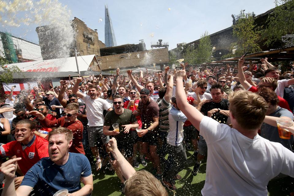  The Frenchman was showered in beer alongside fans up and down the country last night