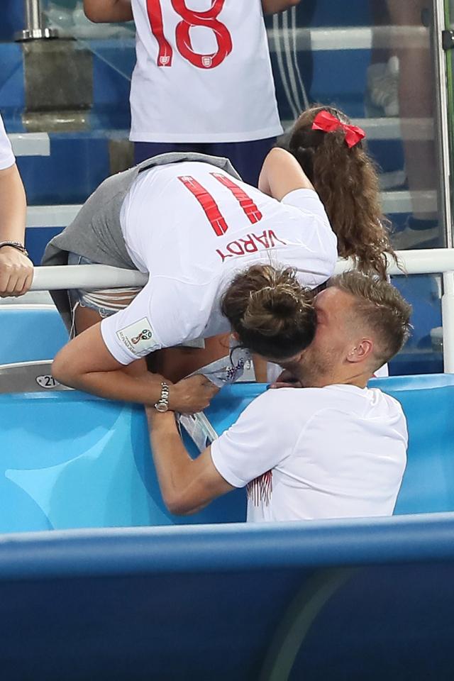  Becky giving Jamie a kiss during England's third group stage game against Belgium