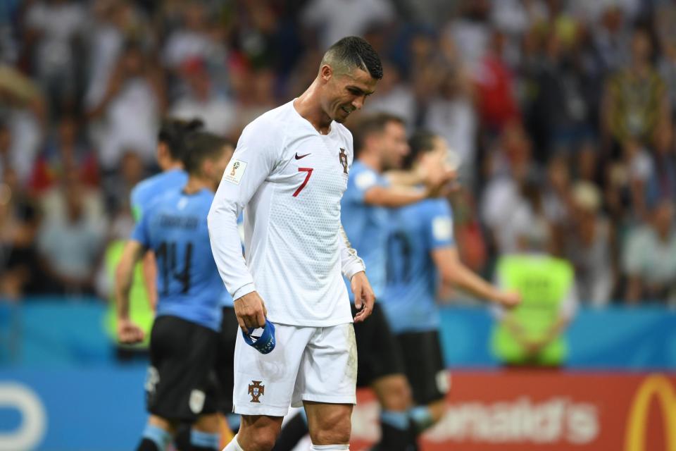 Portugal's Cristiano Ronaldo looks dejected after his nation's defeat to Uruguay