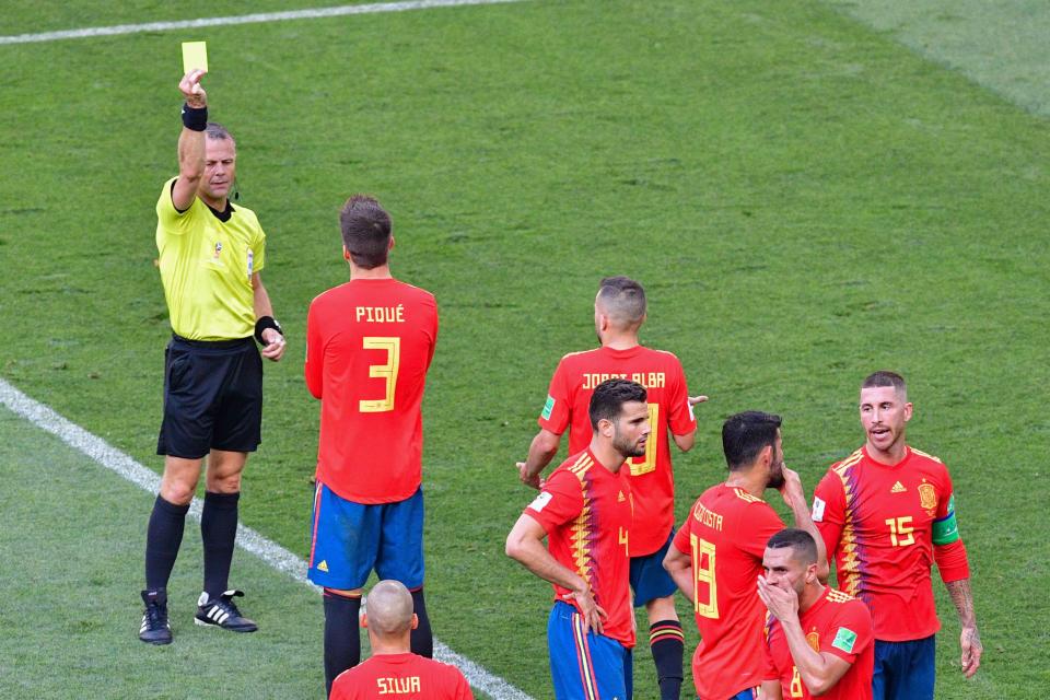  Gerard Pique was booked for the handball and his protestations