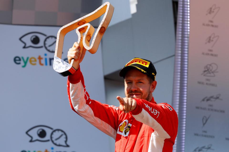  Vettel took third place and the championship lead back from Hamilton by a single point