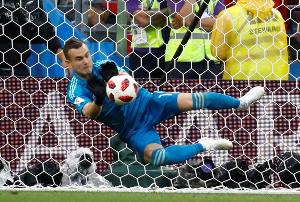  Igor Akinfeev saved two penalties to dump Spain out of the World Cup