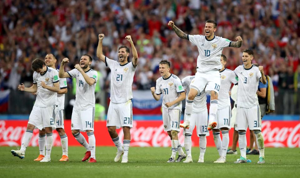  Russia celebrated as one after stunning Spain to reach the quarter-finals