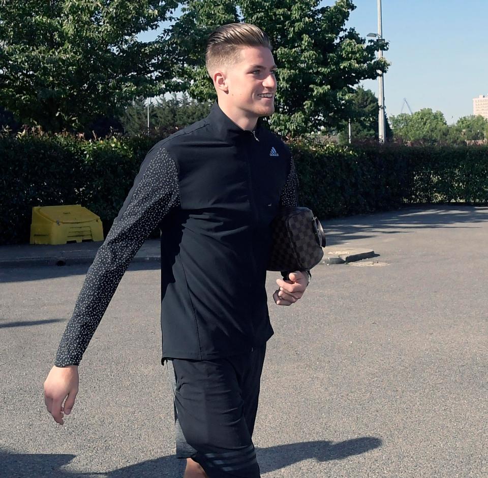  Reece Burke arrived back from West Ham's training camp in Switzerland for a medical in England