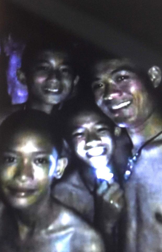  An image shows the boys alive and well after a frantic subterranean search involving experts from across the globe including the United Kingdom