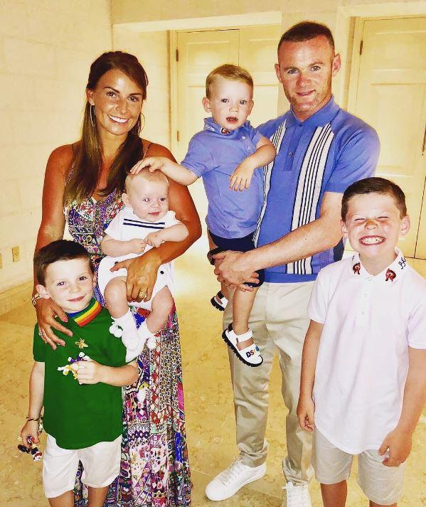  Wayne and Coleen Rooney with boys (from l-r) Klay, five, baby Cass Mac, who was born in February, Kit, two, and Kai, eight