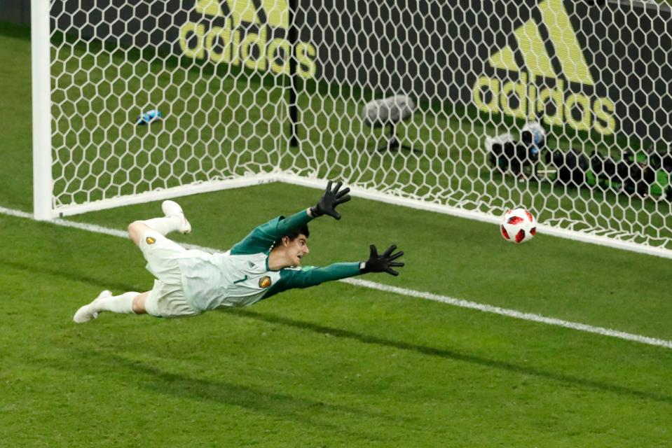  Thibaut Courtois is easily beaten for Japan's second goal against Belgium