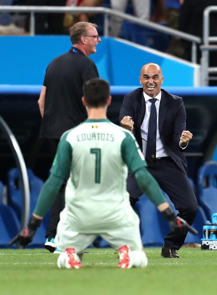  Courtois and Martinez were ecstatic after Nacer Chadli's 94-th minute winner