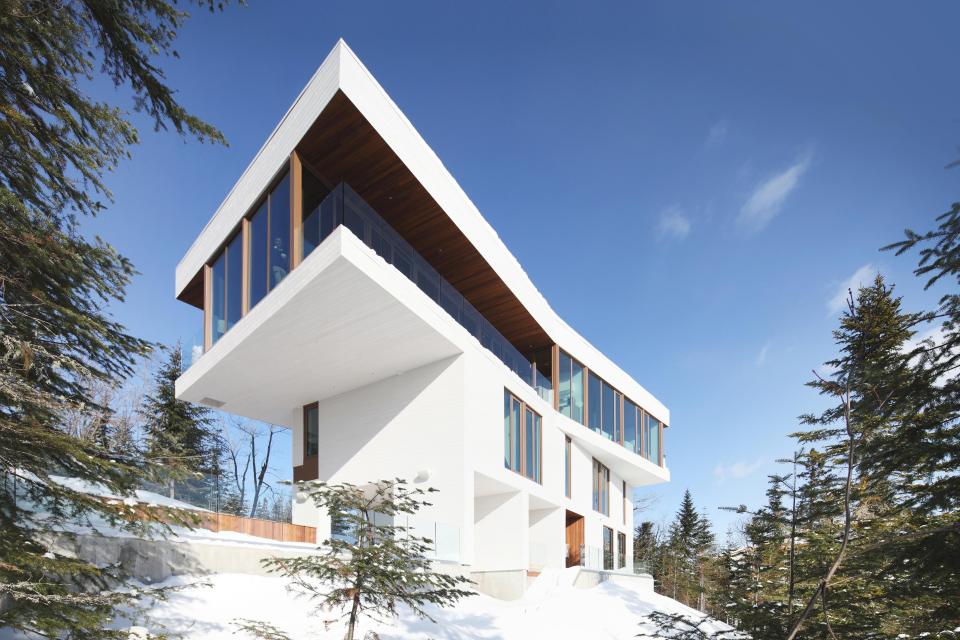  This luxurious three-storey home in Quebec, Canada, offers incredible panoramic views over the St. Lawrence River