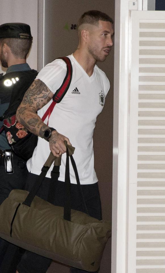  Sergio Ramos carried his bags off after Spain were knocked out of the World Cup