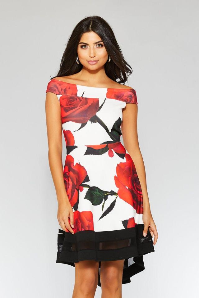  The rose print makes a statement and the bardot style keeps it classy