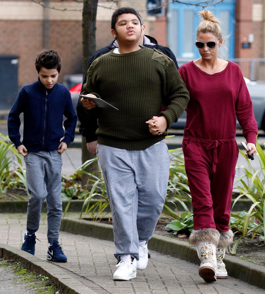  Katie Price left disabled son Harvey, 16, with the next-door neighbour when she jetted off to Thailand with lover Kris