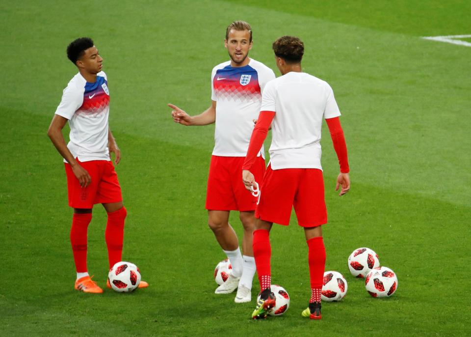  England players warm up ahead of their last-16 win over Colombia