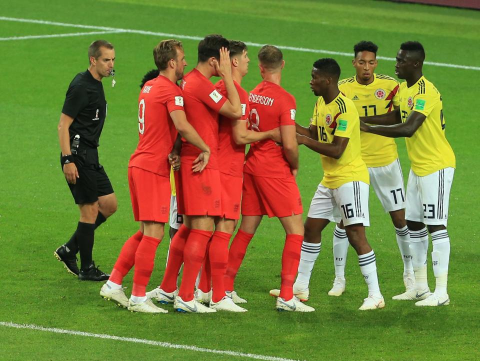  England's 'Love Train' line up for a corner against Colombia