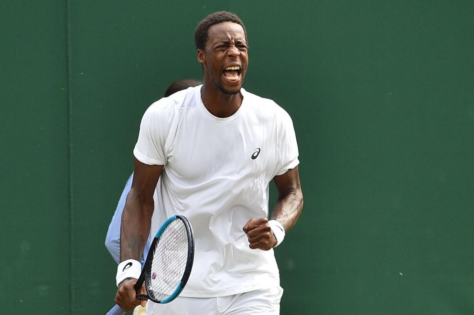  Gael Monfils celebrates after reaching the third round at Wimbledon