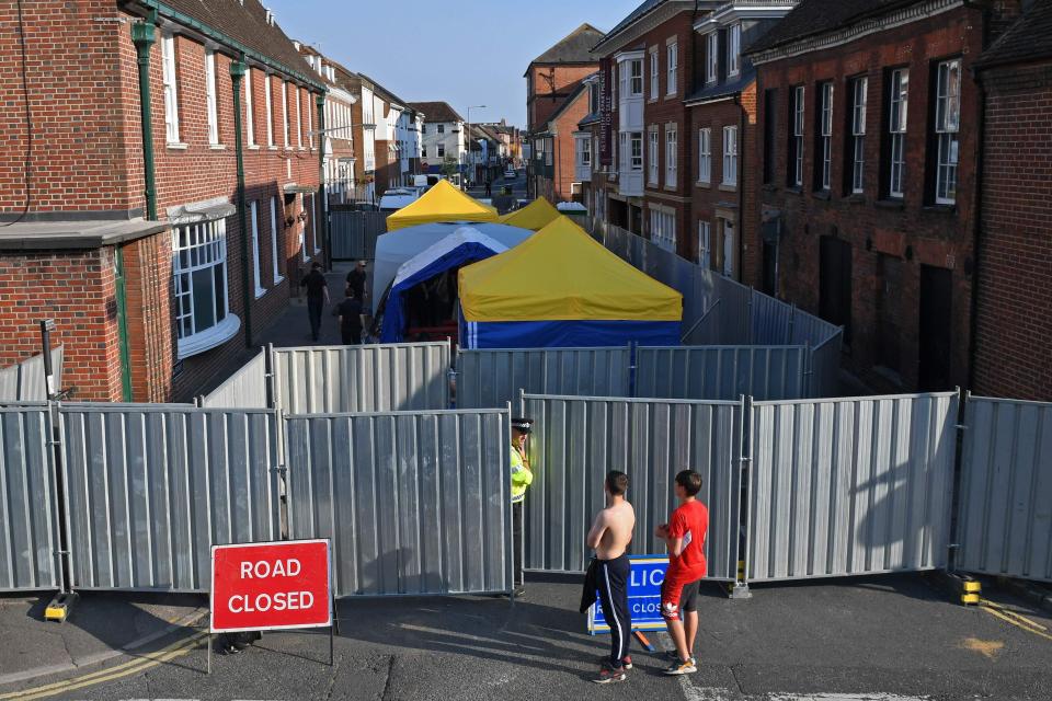  The street behind the couple's house was cordoned off by police