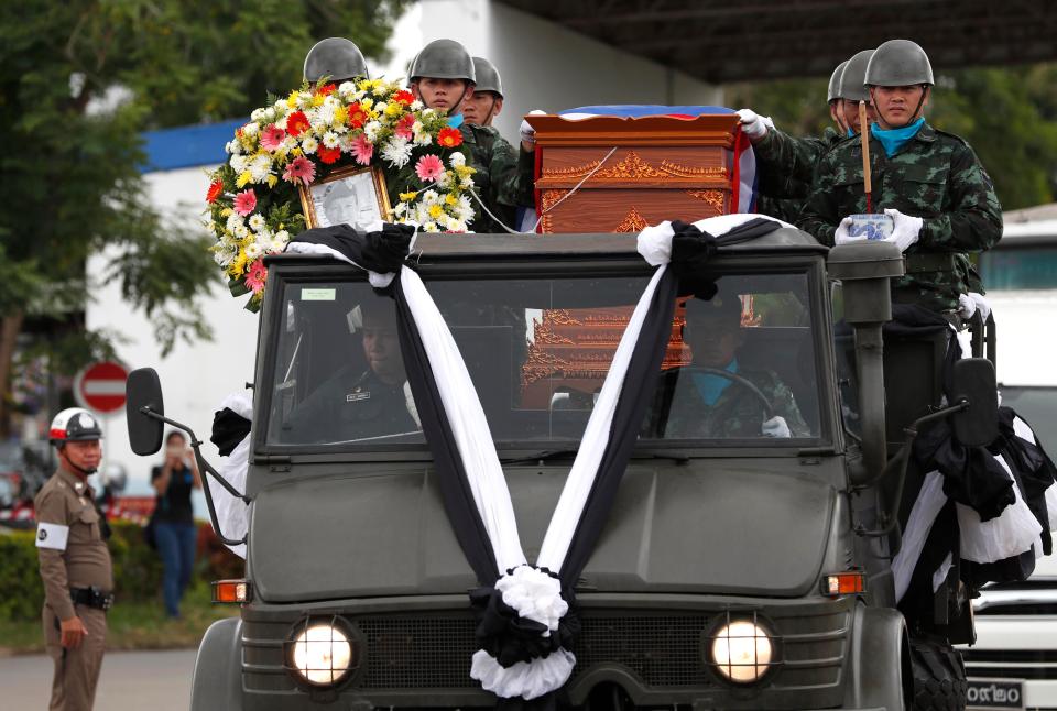  Saman's flag-draped coffin arrives at the airport to be taken home today