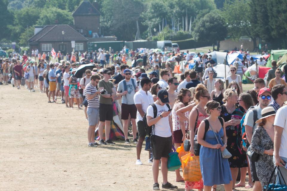  Hundreds of tennis fans queue in the sweltering heat for Wimbledon tickets as temperatures rocket today