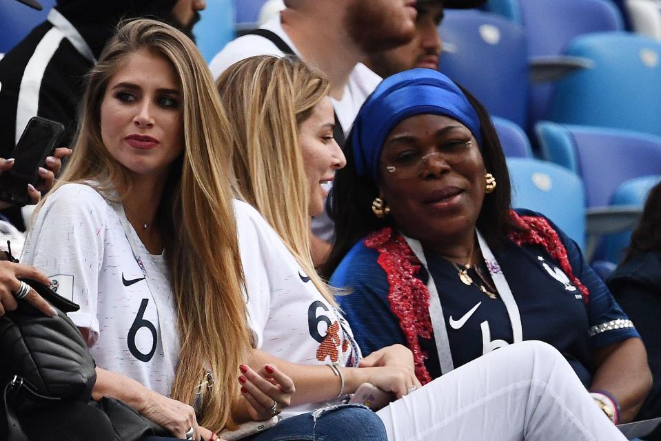  Maria Salaues sits with Paul Pogba's mum Yeo to watch France against Uruguay