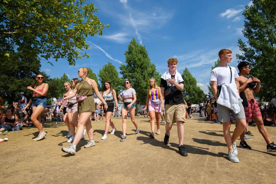  Festival-goers enjoy the hot weather at Wireless Festival in Finsbury Park, North London