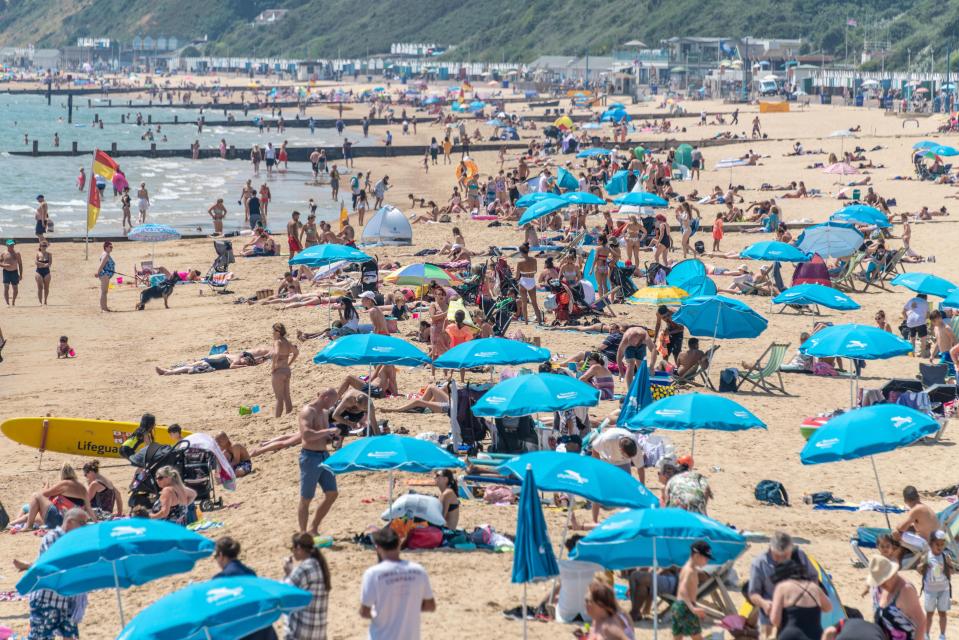  Sunseekers soak up the rays on Bournemouth beach