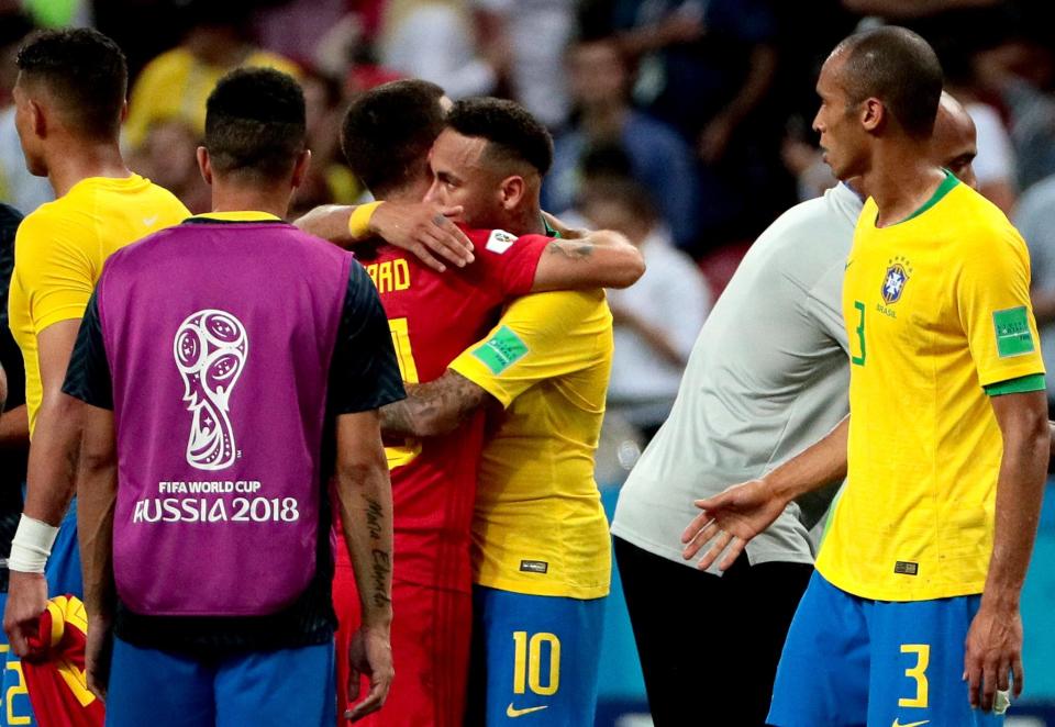  Neymar and Eden Hazard hug after Belgium had sent Brazil crashing out of the World Cup