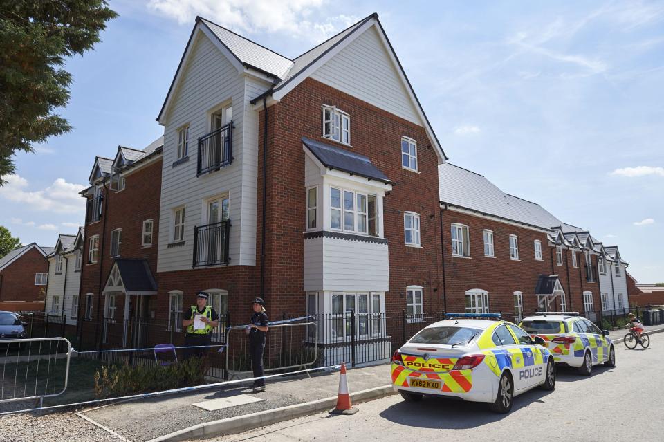  Police officers stand guard at a residential house in Amesbury, where Dawn Sturgess collapsed on June 30