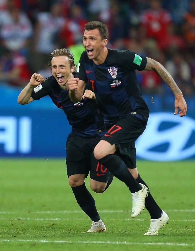  Mario Mandzukic and Luka Modric celebrate after winning the penalty shootout