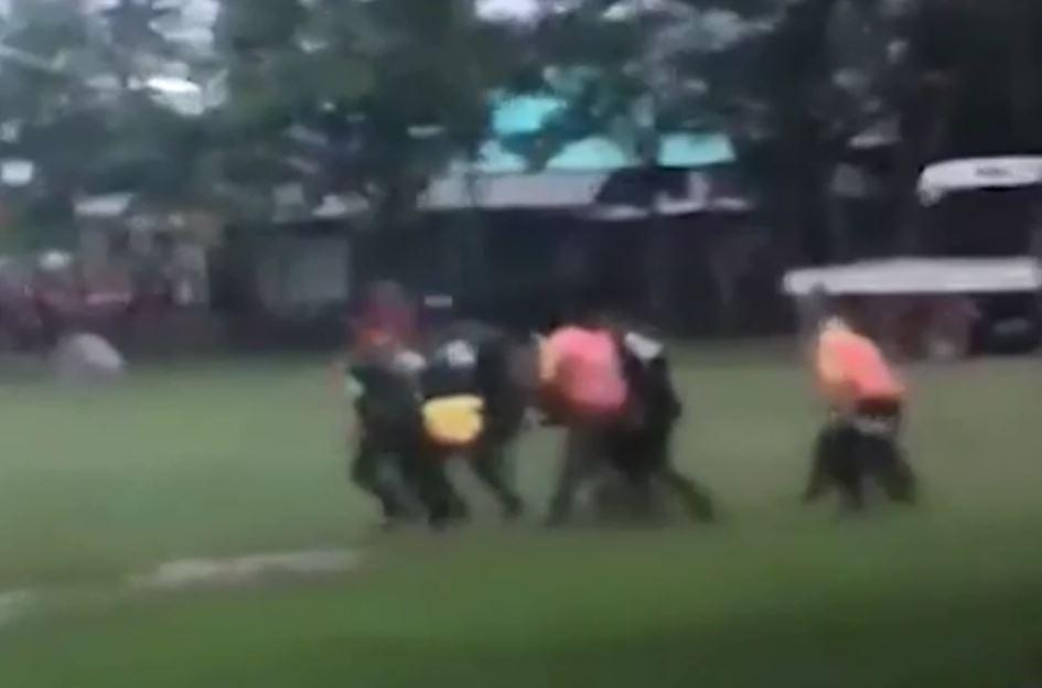  One of the trapped Thai boys is rushed to a waiting air ambulance to take him for treatment after being rescued from the cave