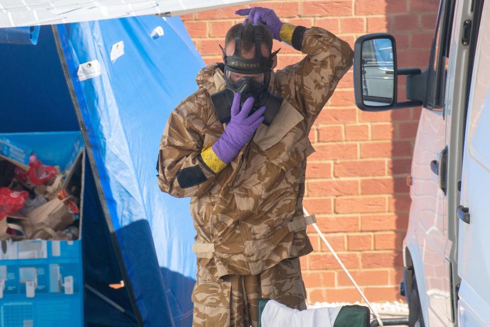  People in protective clothing at the home of Charlie Rowley, 45 after he and Dawn were exposed to Novichok