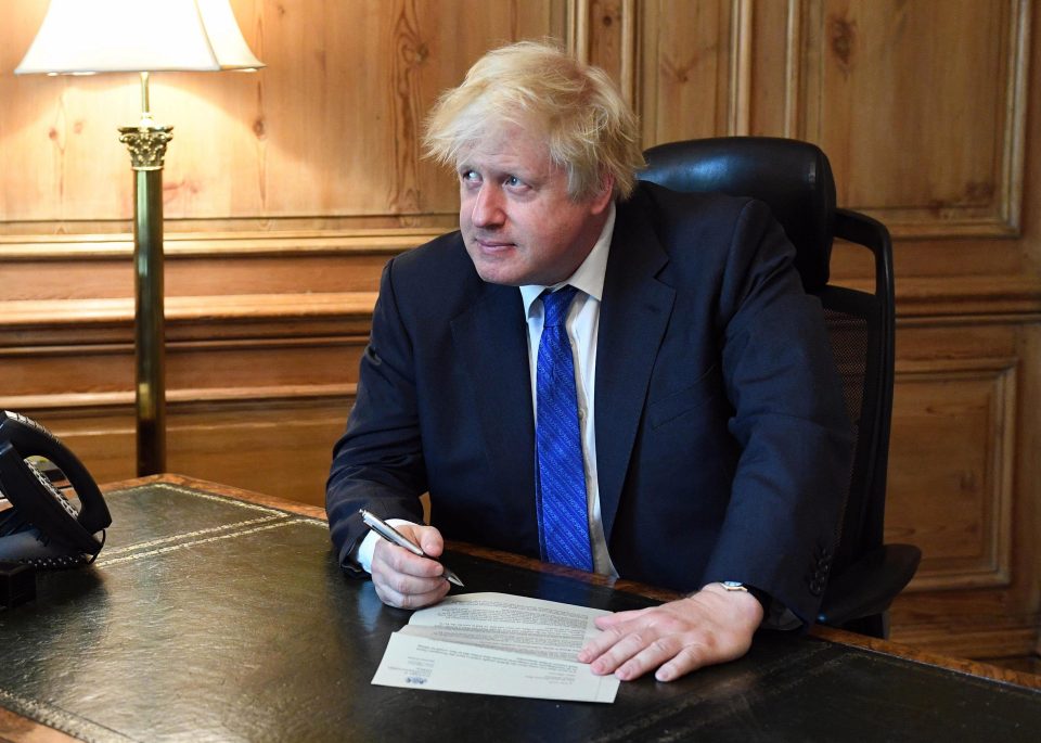  Mr Johnson writing his statement of resignation