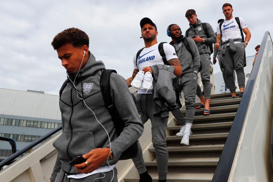 The England squad looked focused as they made their way off the plane