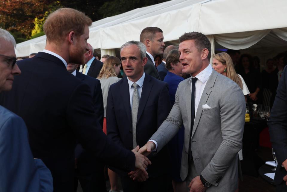  Harry was quizzed by Irish rugby legend Brian O'Driscoll as he began his two-day visit to Dublin with wife Meghan - their first overseas foreign trip as a married couple