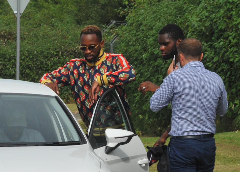  Striker Moussa Dembele, left, was at the scene - but in a car trailing his team-maters