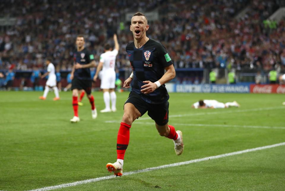  Ivan Perisic celebrates putting Croatia into the lead with a superb volley as he ghosted in in front of Kyle Walker