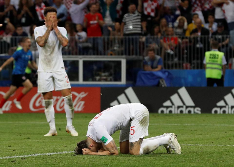  Kyle Walker and John Stones react to England going behind in extra time