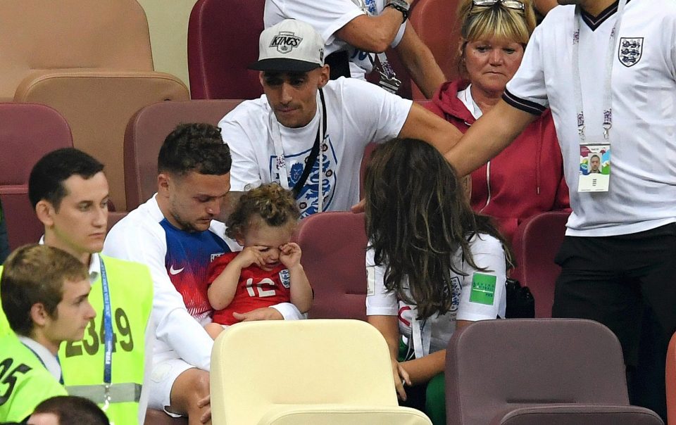  A downcast Kieran Trippier with his family after the game