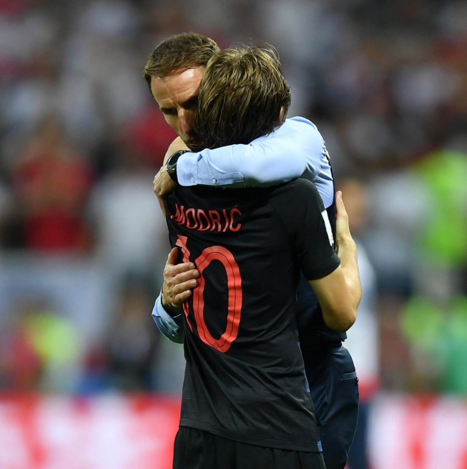  Gareth Southgate hugs Croatia star Luka Modric - who England could not cope with