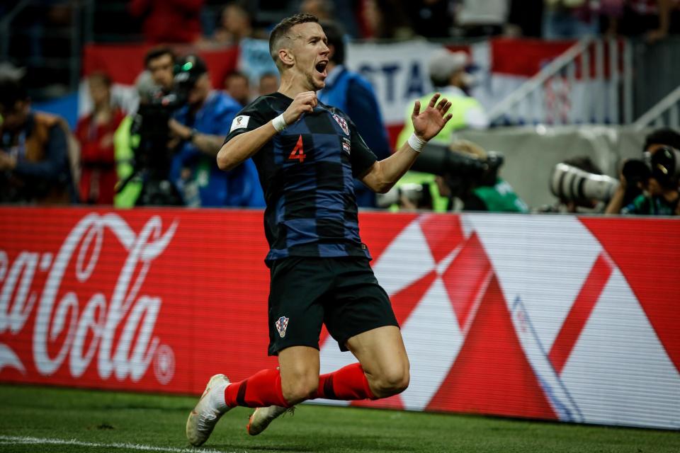  Perisic celebrates scoring the equaliser against England after volleying in from close range