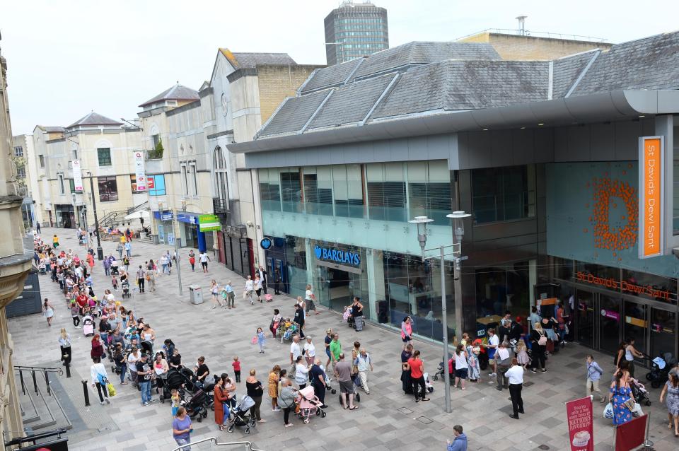  People lining up outside the shopping mall in Cardiff