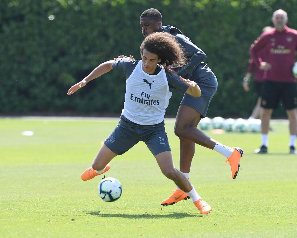  Chuba Akpom takes on Arsenal newbie Matteo Guendouzi during training.