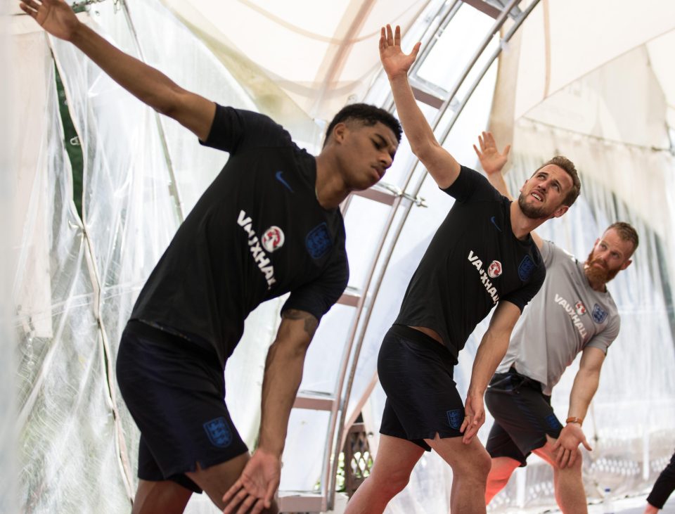  Marcus Rashford and Harry Kane stretched during the recovery session