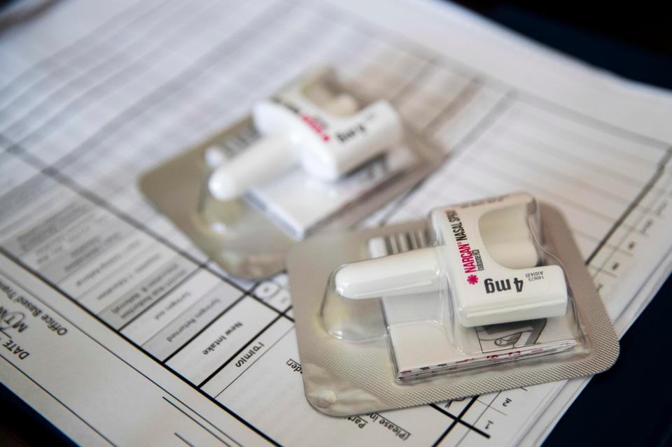  A Narcan nasal device, which delivers naloxone, lies on a counter