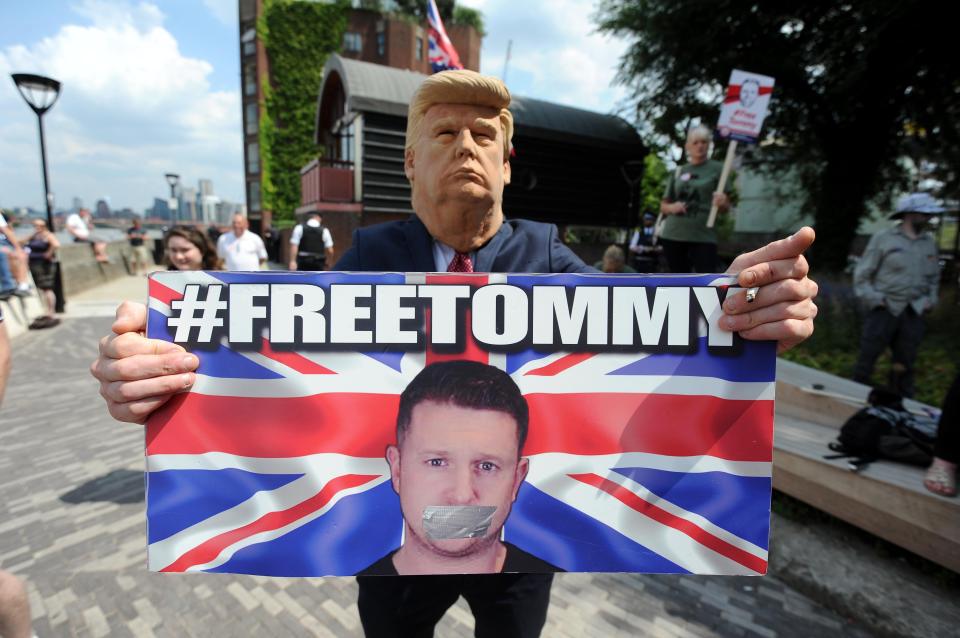  A Free Tommy demonstrator wears a Trump mask during demonstrations in support of the jailed activist